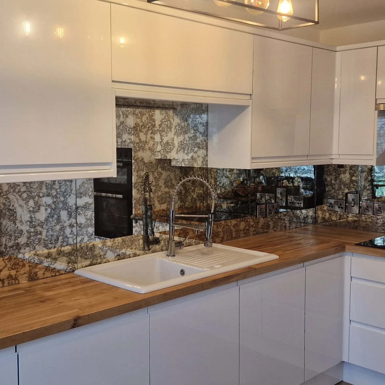 Antiqued mirror glass kitchen splashback fitted by Coleraine Glass, Northern Ireland