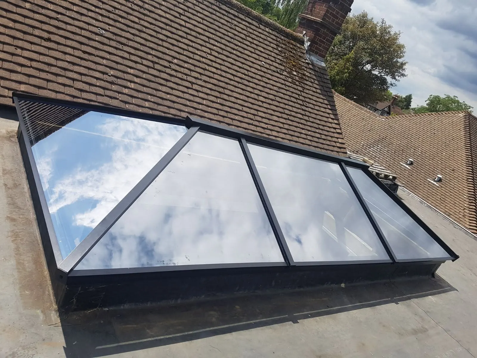 Aluminium roof lantern on a flat roof extension