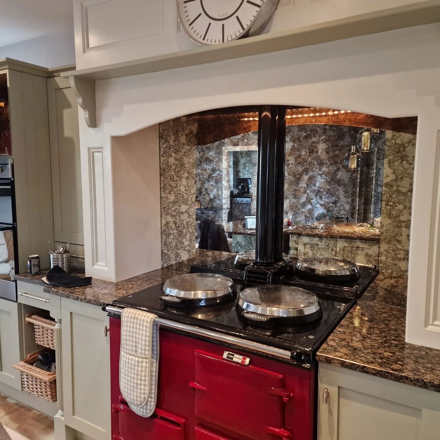 Antiqued mirror splashback fitted behind a range cooker by Coleraine Glass, Northern Ireland