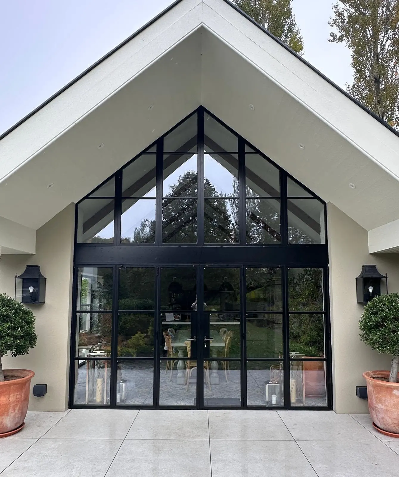 Black aluminium glazed gable with French doors fitted by P Black and Son, Northern Ireland