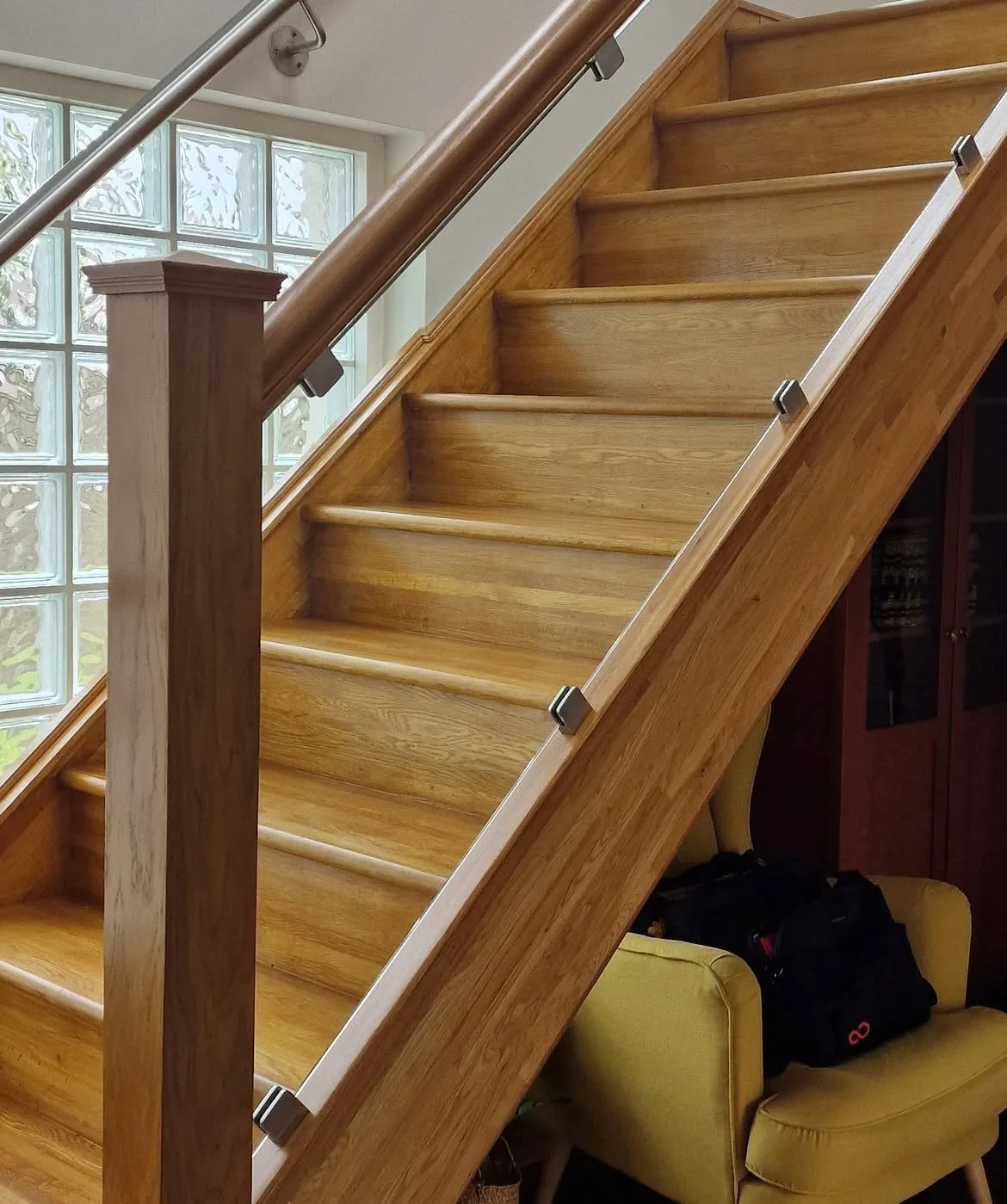 Oak staircase with frameless glass balustrade and stainless handrail fitted by Coleraine Glass, Northern Ireland