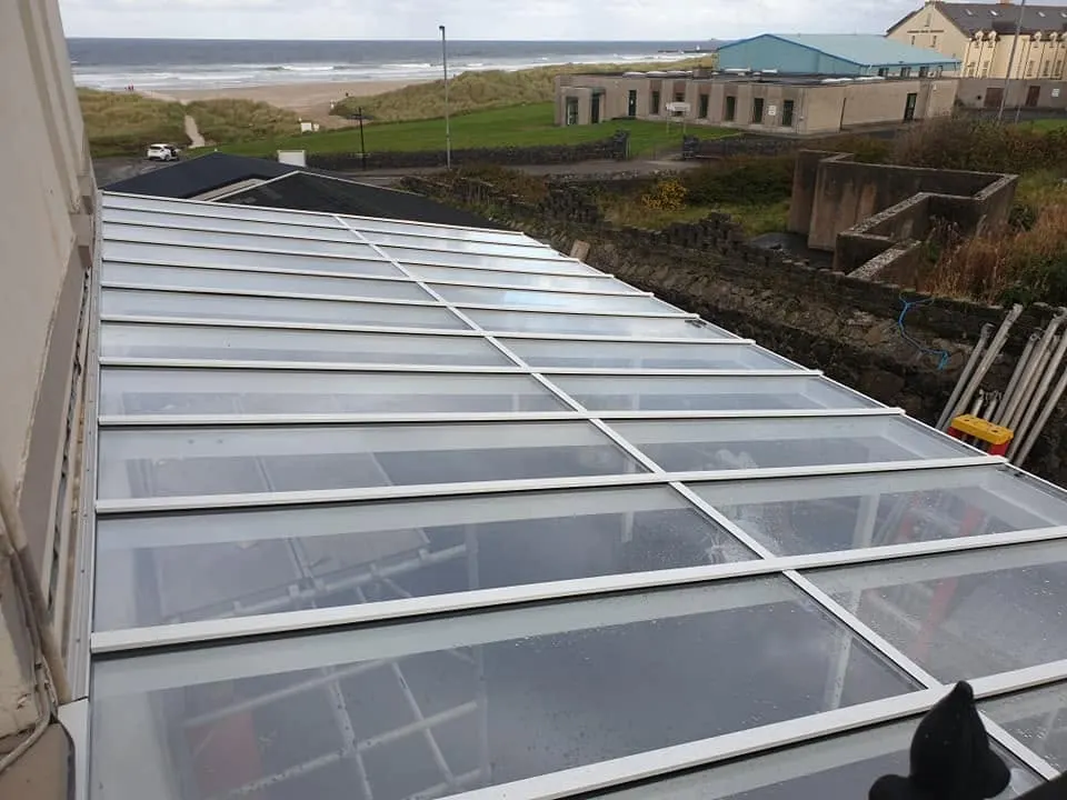 Glass roof over a seaside extension